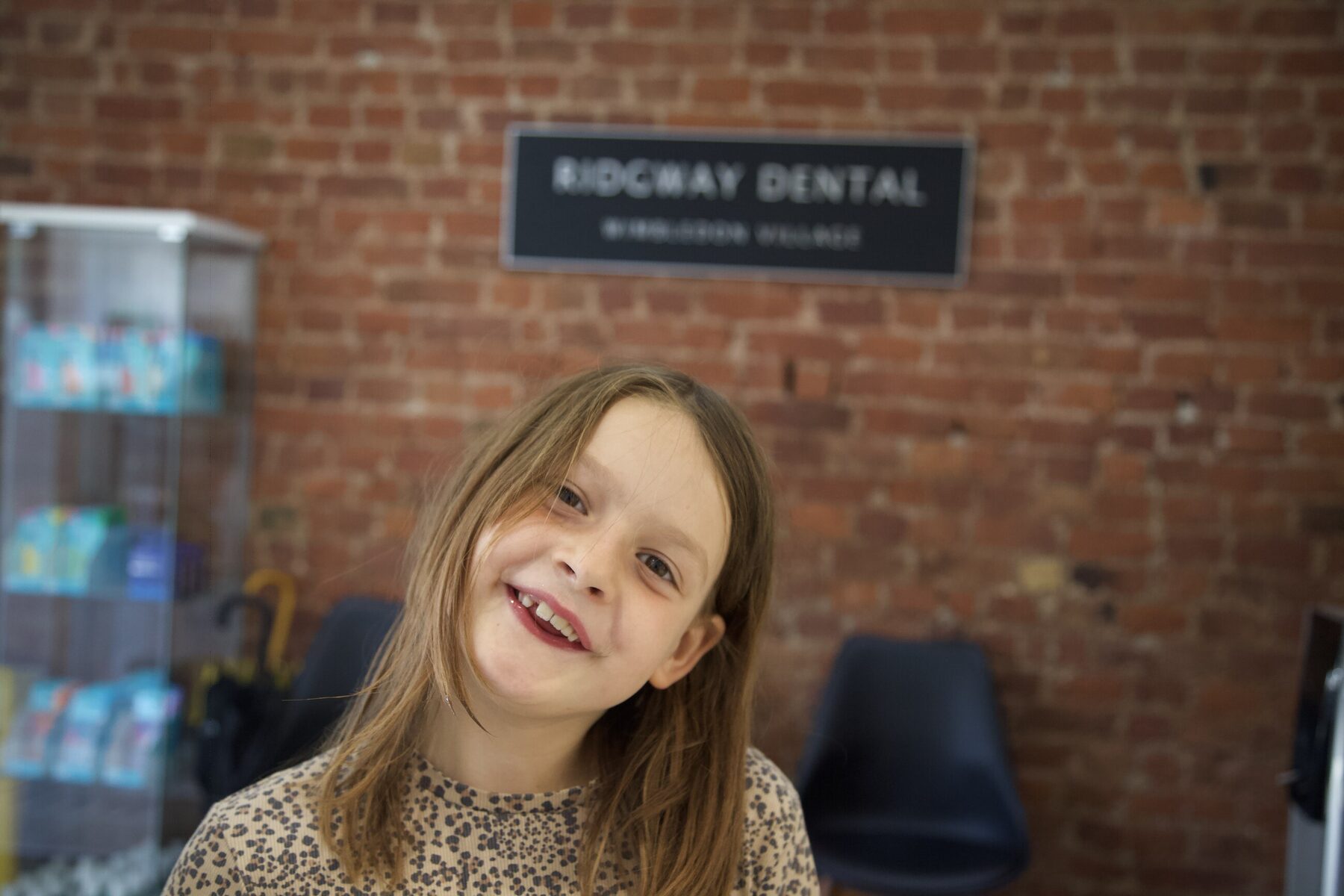 A patient smiling at Ridgway Dental